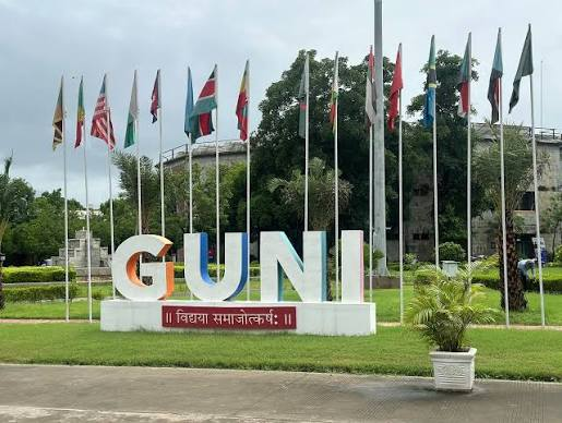 GUNI campus entrance with international flags
